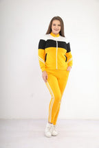 Tenue de sport moutarde et noire à fermeture éclair en coton