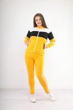Tenue de sport moutarde et noire à fermeture éclair en coton