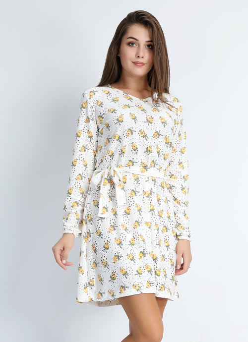 Short yellow dress with open flower motif