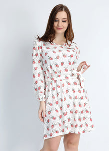 Short red dress with open flower motif