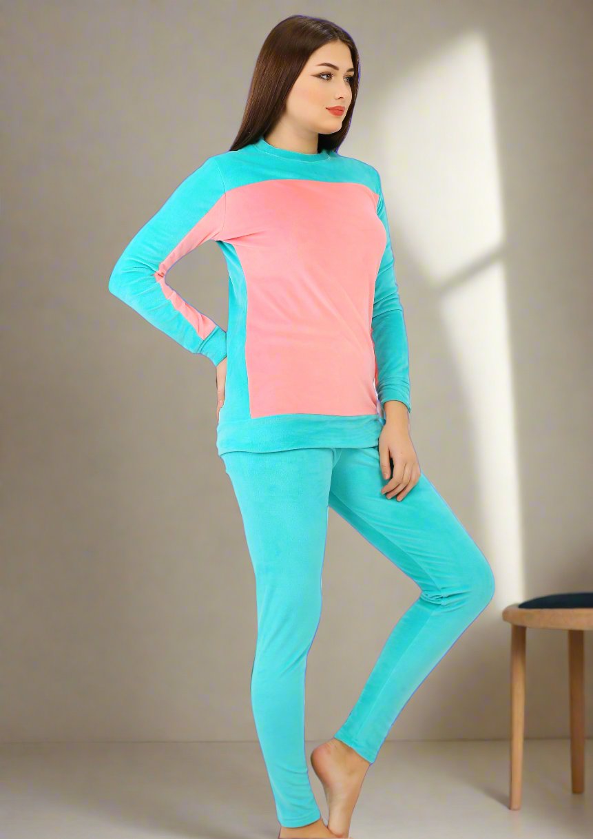 Turquoise Heidi pajamas with lining on both sides with chest and inside arms in pink color