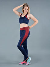 Load image into Gallery viewer, Two pieces of navy blue and burgundy polyester sport set